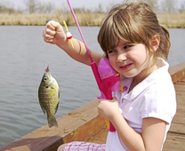 little girl caught a small fish